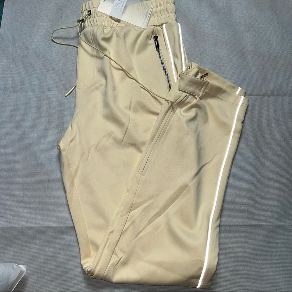 Guapi pale yellow reflective piping joggers NWT size 40